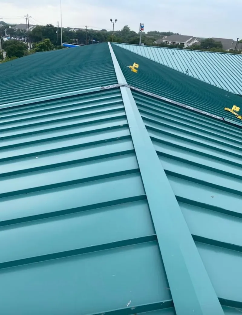 Green commercial metal roof ridge and valley for Metal Roof Repair in Birmingham